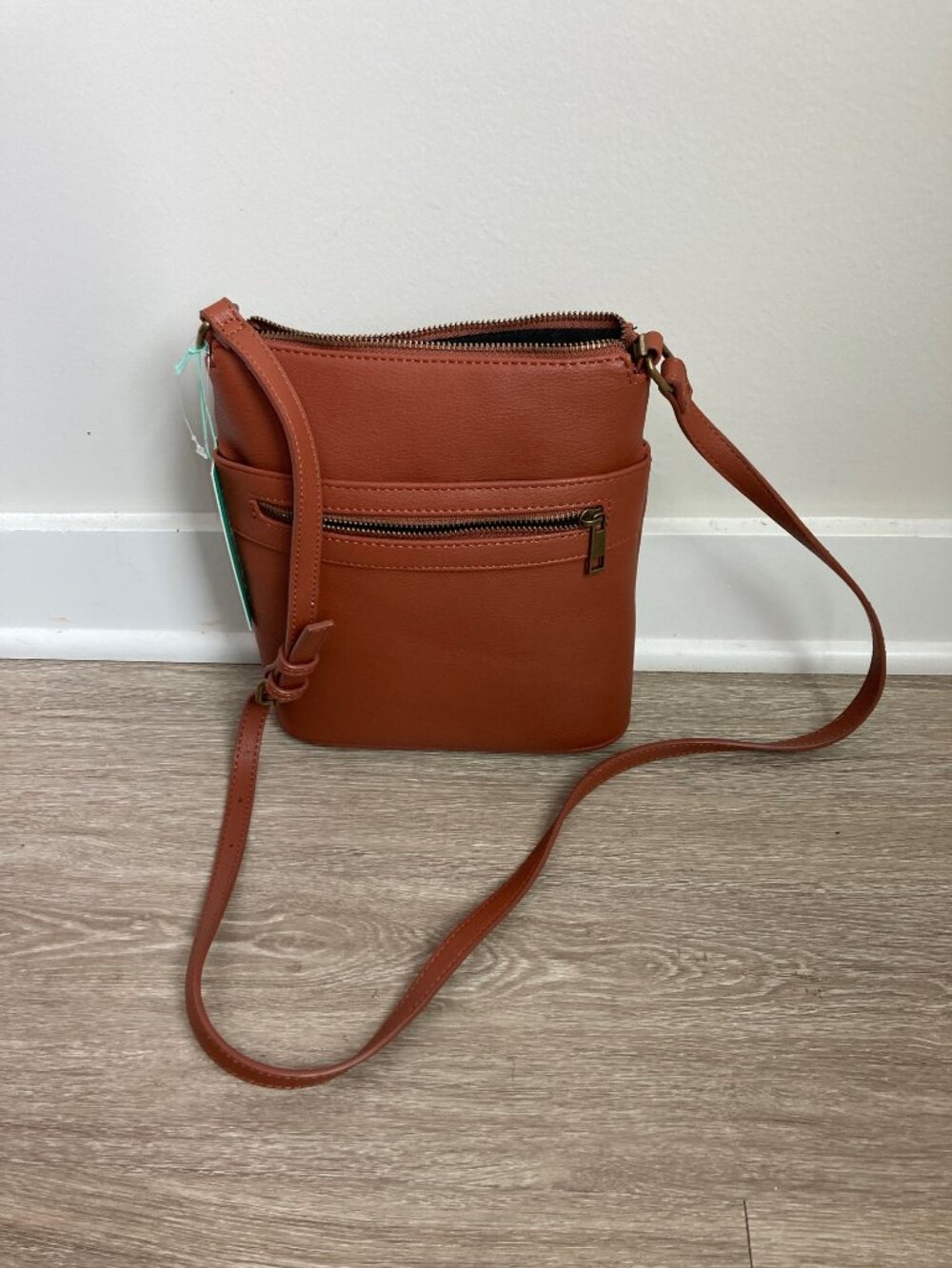 Cognac Brown Faux Leather Crossbody Bag With Front Zip Pocket.